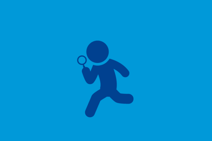 虫眼鏡を持った人